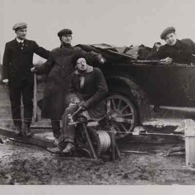 Four men with car/winch system at Wingfoot Lake