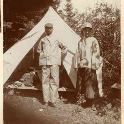 Will and Grace Chase dressed in rain slickers