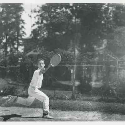 C.W. Seiberling, Jr. playing tennis