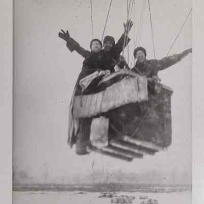 Three men in an observation balloon basket