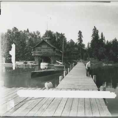 F.A. Seiberling on the dock at Cedar Lodge