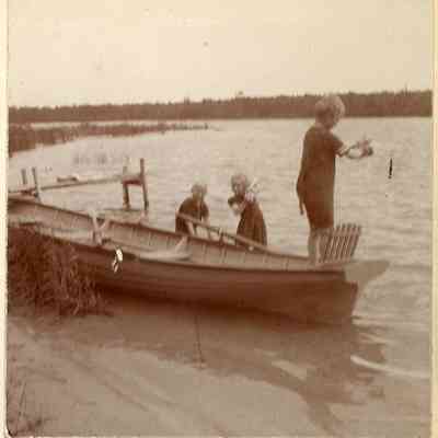 Fred, Irene & Willard with a rowboat