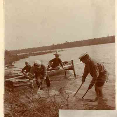 F.A. Seiberling and another man fishing with nets