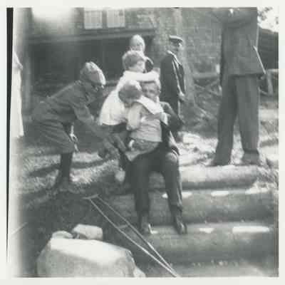 F.A. Seiberling and children playing