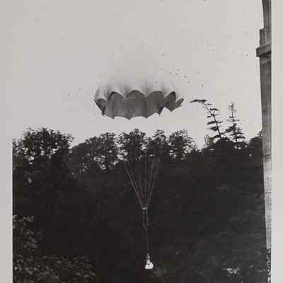Parachute weighted with sandbags