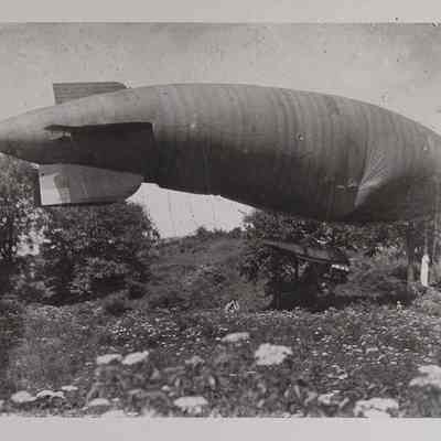 Dirigible crashing into a field