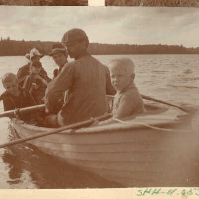 Family in a rowboat