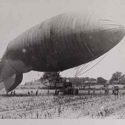 Dirigible crashing into a field