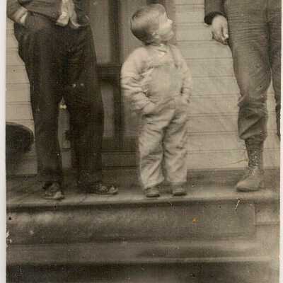 Little Boy on Porch