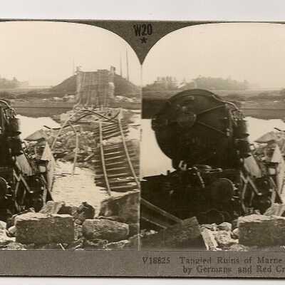 Tangled ruins of Marne Bridge blown up by Germans and Red Cross train wreck.