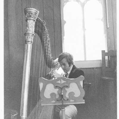 Man Playing Harp