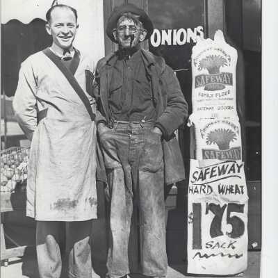 Two Men standing front of Safeway store in Estacada