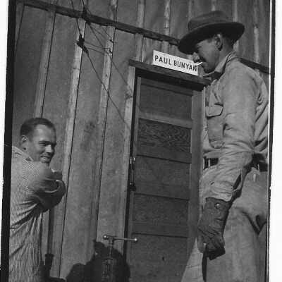 Men Cutting Pipe