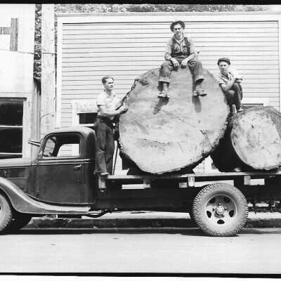 Glen Park Sitting on Truck Load of Logs