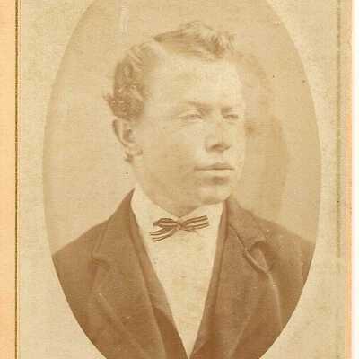 Man in suit Currin?
