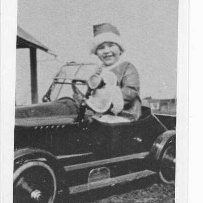 Child in Toy Car