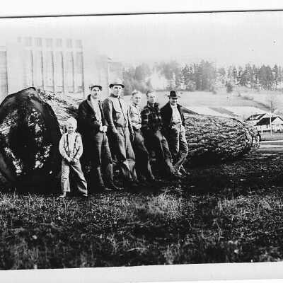 Large Log with People by Estacada School