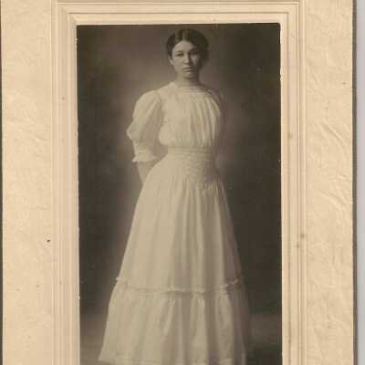 Woman in white, Posed