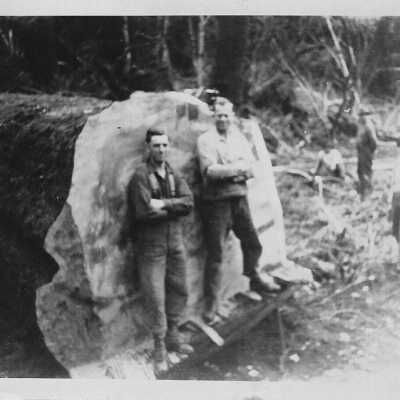 Two Men and Large Log