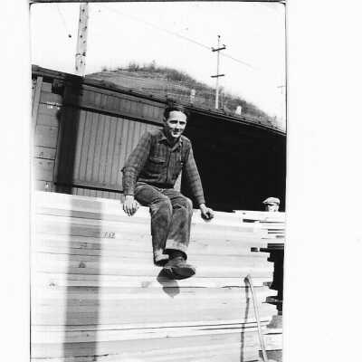 Lumber in front of Railcar