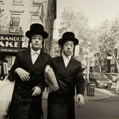 Two Men Crossing Street