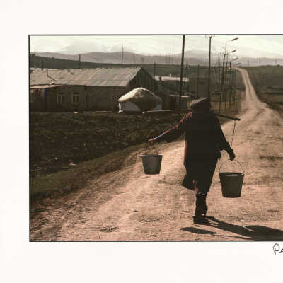 Armenian farmer carrying buckets, Armenia