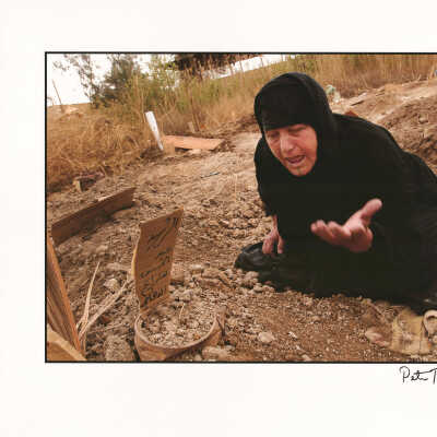 Mother grieves the death of a loved one, Iraq