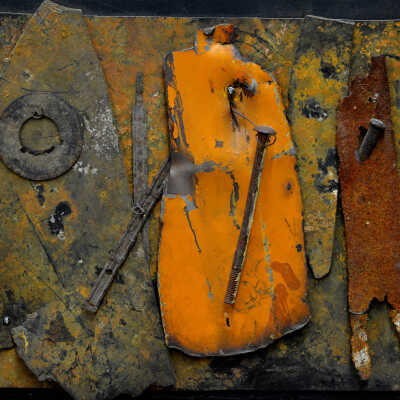 Hanging Nail Over Orange