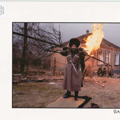 A Chechnyan soldier prepares to pray while Russian forces shell Grozny. Grozny, Chechnya, Russia