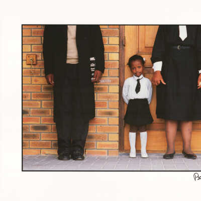 A girl and her parents, Soweto, South Africa