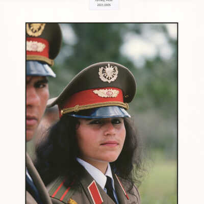A young female soldier is among the marchers at a military parade held in honor of Mikhail Gorbachev's visit to Cuba, Havana