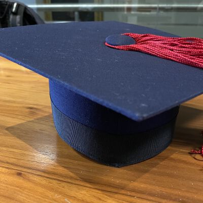 Mortar board hat and tassel