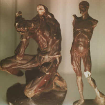 Two Small Human Figures
