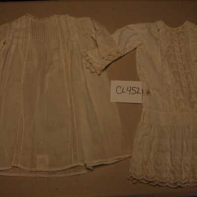 Two white cotton dresses