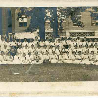 Photograph of a group of ladies in front of the courthouse