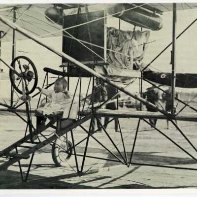 Baby in a Bi-Plane: Origsize: 10"X8"; Origformat: Artifact