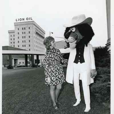 Beauregard Lion with lady in Downtown El Dorado 1972 photograph