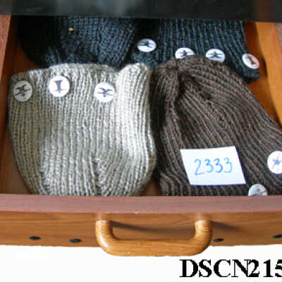 Hand-knitted caps with Halfwood Press buttons