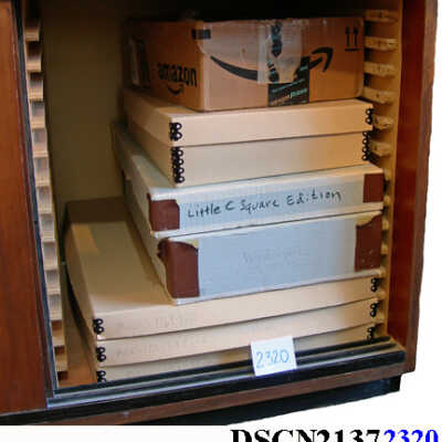 Cabinet of boxed art