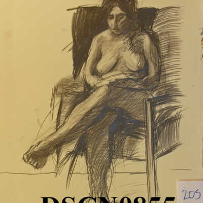 Seated Woman Appearing Tired