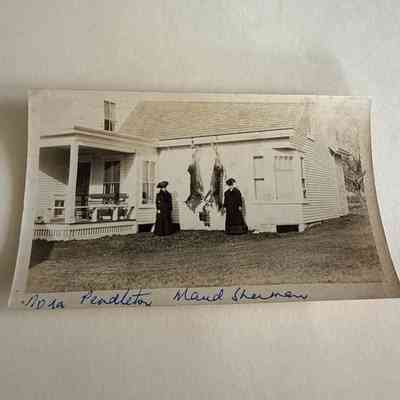 Hanging deer with Nora Pendleton and Maud Sherman