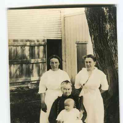 Postcard of Charlotte William, Nettie Rose, Theresa Rose and a baby