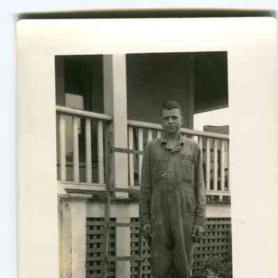 Young man in coveralls, postcard