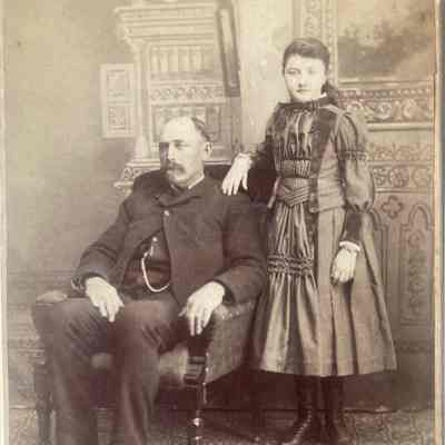 Cabinet card portrait of man and young girl