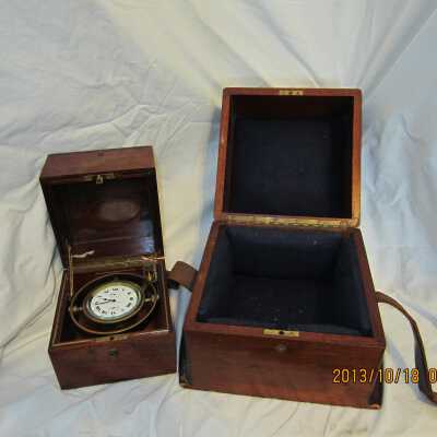 Ship's watch, clock case removed from padding