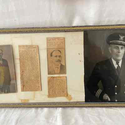 Framed images of Benjamin Thomas and Newspaper clippings