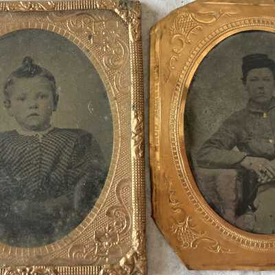 Pair of tintype portraits in copper frames
