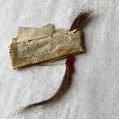 Lock of hair belonging to Alice E. Williams, age 9