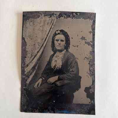 Tintype portrait of woman in dark dress