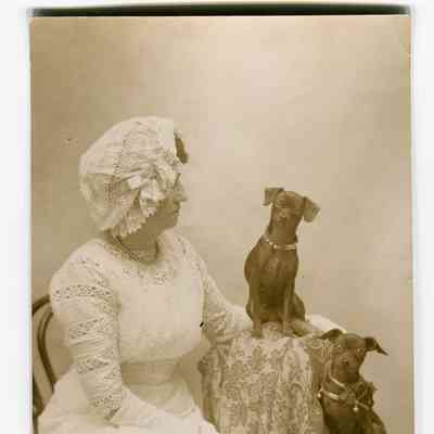 Postcard of Mrs. Georgia Allen and her dogs